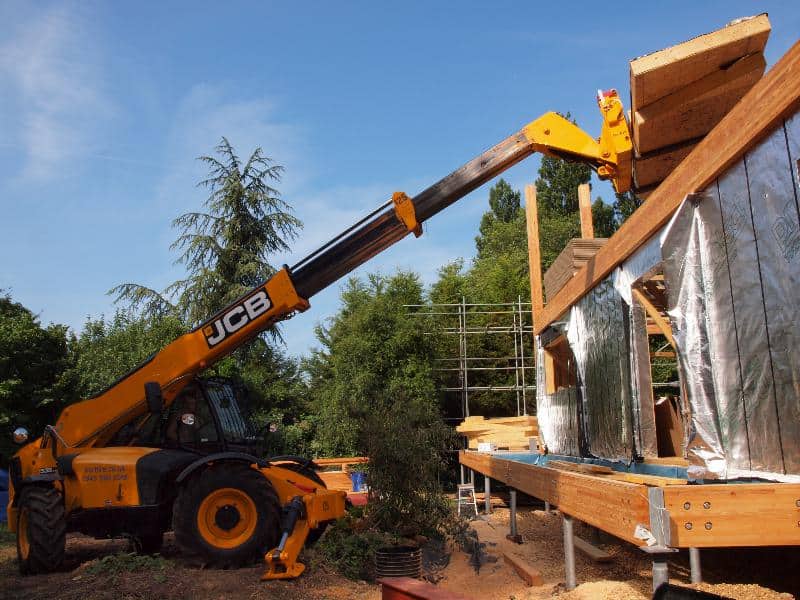 Telehandler Erecting Timber Frame Panels