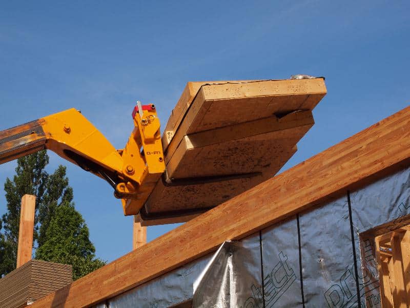 Telehandler Erecting Timber Frame Panels