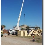 Crane Lifting Panels into Place