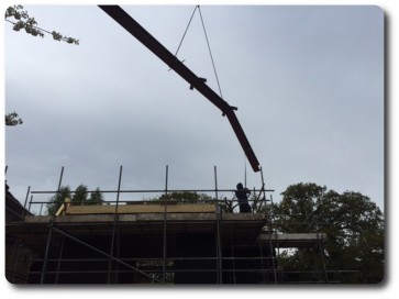 Steel Beams Lifted into Place by Crane