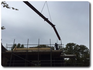 Steel Beams Lifted into Place by Crane Steel Beams Lifted into Place by Crane