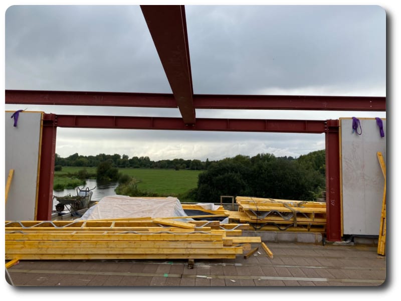 A Panoramic view of the countryside through the steel frame