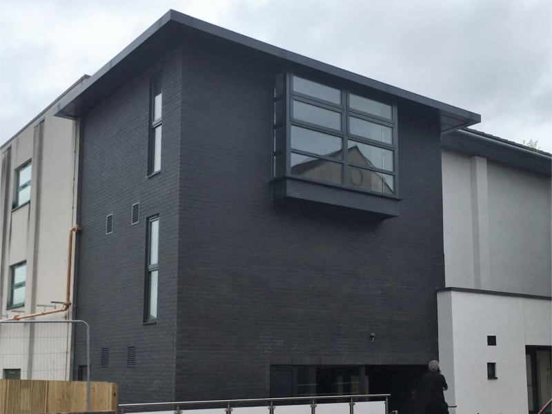 Prefab closed panel timber frame extension for church in Winchester