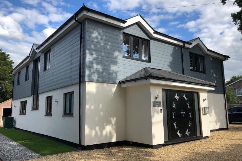 Bungalow After Conversion with timber frame upstairs