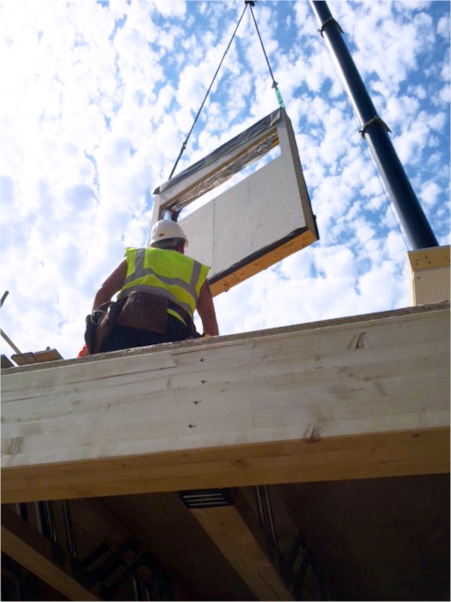 Timber Frame Panel being lifted into place