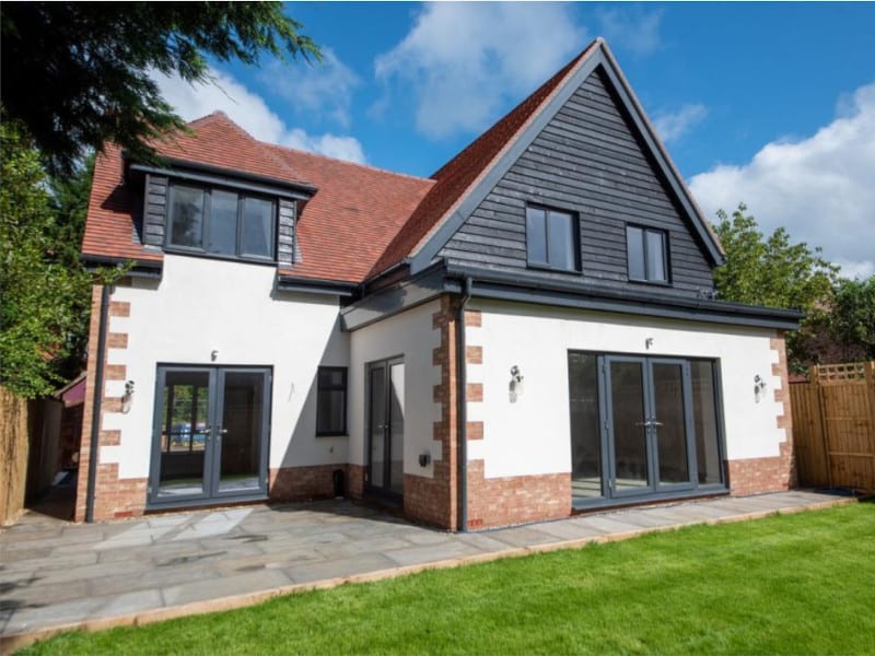 Timber Frame House with Rendering and Wood Cladding