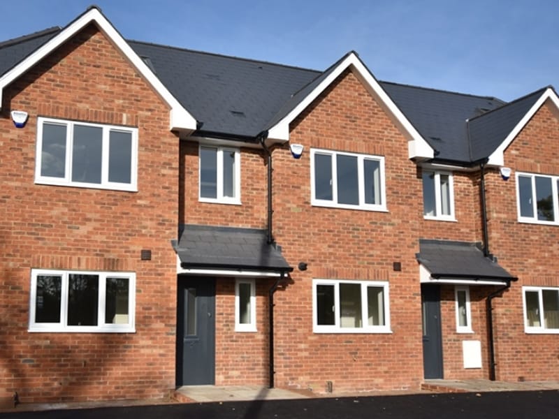 Timber frame building using Spandrel Panels